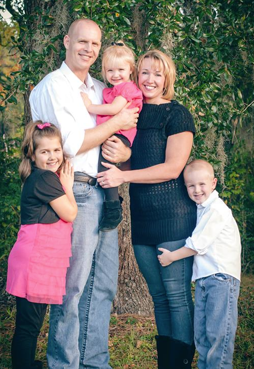 Dr. Nichole Quinn with a family at Total Family Wellness in North Charleston, SC